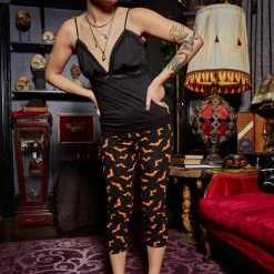 What's New SOURPUSS ORANGE LUNA BATS KNIT CAPRIS