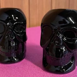 Haunted Homewares SOURPUSS SKULL CANDLESTICK HOLDERS BLACK